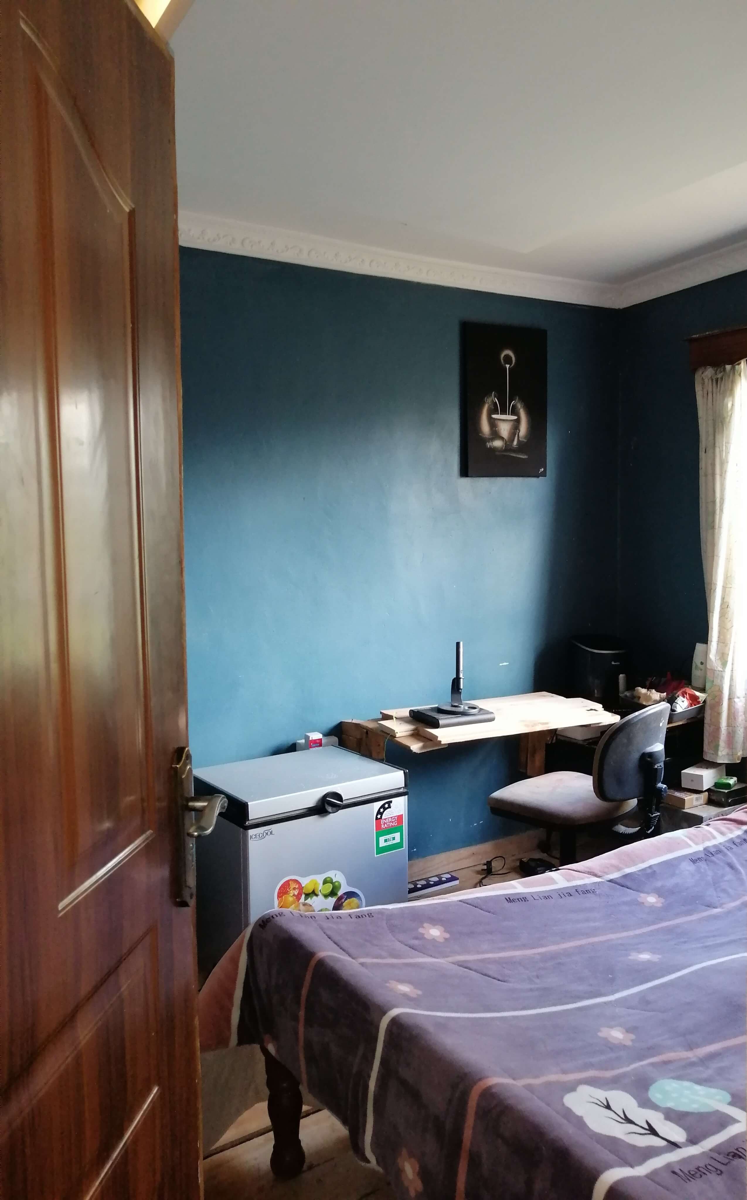 Mr. and Mrs. Samson Ngotho's One-Story House Bedroom