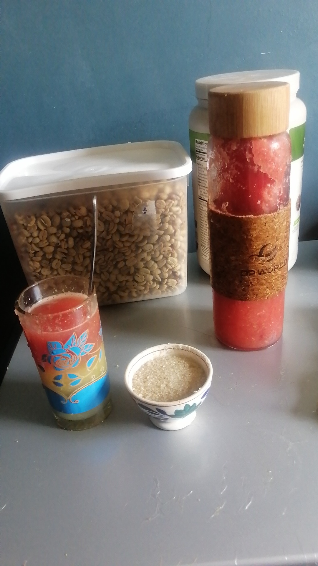  Pulpy orange juice beautifully served in a glass with watermelon and pineapple juice, sugar in a smoking dish and dry parchment coffee in a container